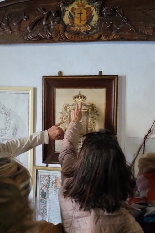 Visitors admire the embroidery of Our Lady of the Rocks. Photo by Eric D. Goodman