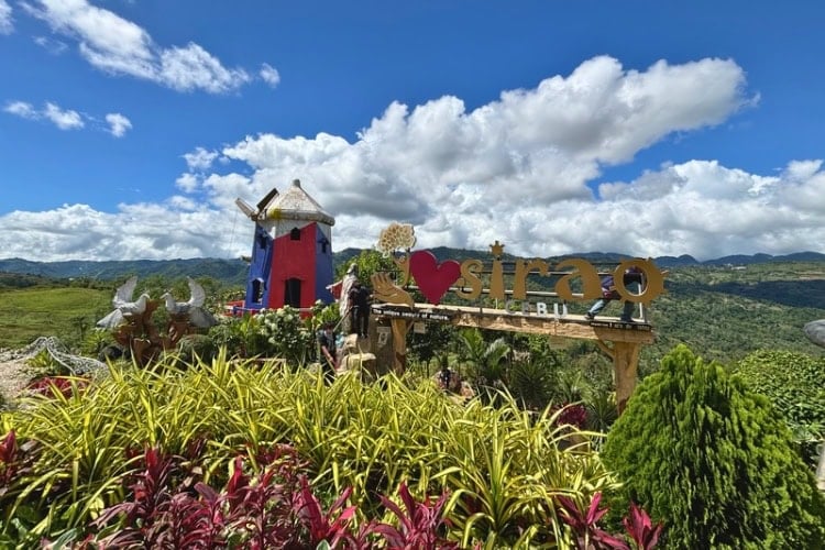 Windmill in Philippine flag colors and "I Love Sirao" sign at Sirao Garden in Barangay Sirao, Cebu. Photo by Nikola Mikovic