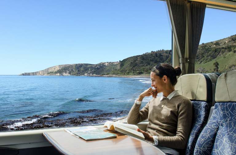 A woman traveling on the Captivating Coast Signature Tour by Great Journeys New Zealand