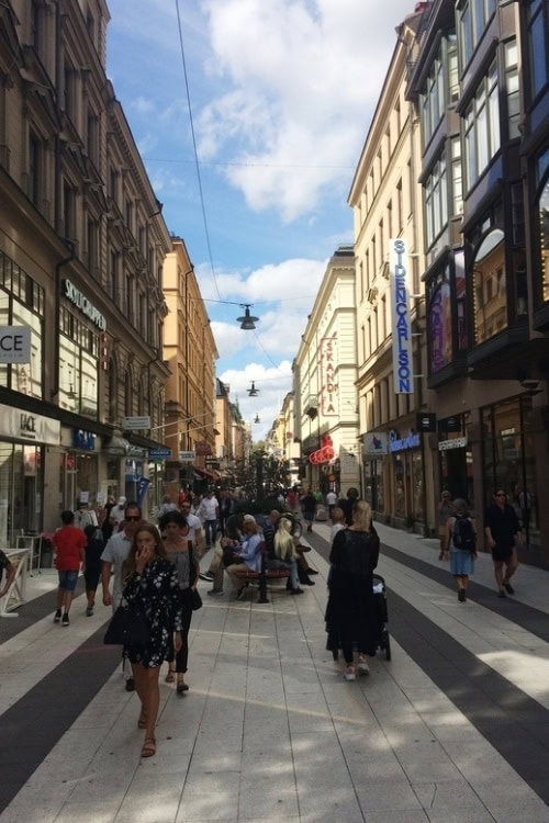 Pedestrian pathway bordered by every retailer imaginable. Photo by Brent Cassie