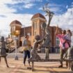 A family with The Four Spirits statue in front of 16th Street Baptist Church. Photo courtesy of the Greater Birmingham Convention and Visitors Bureau