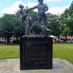 A statue in Kelly Ingram Park depicting police brutality against the children's crusade foot soldiers.