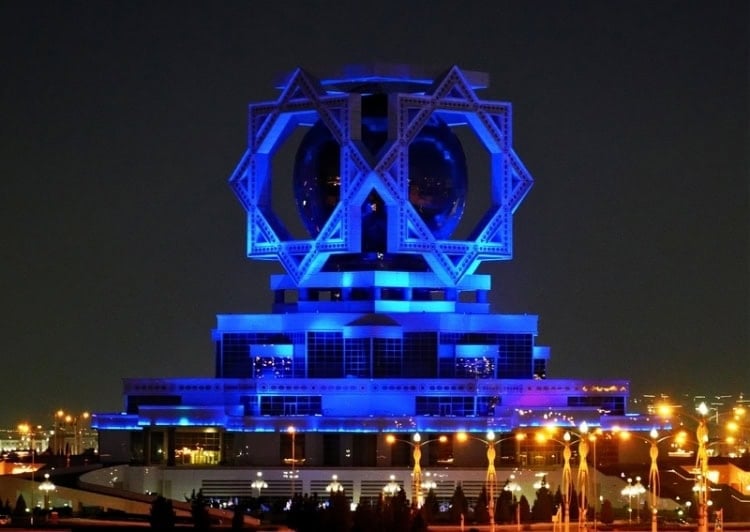 Ashgabat, the Las Vegas of Central Asia, with buildings colorfully lit up at night. Photo by Edward Placidi