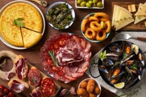 Experience Barcelona through its delicious food. Image by StarpStock from Getty Images via Canva