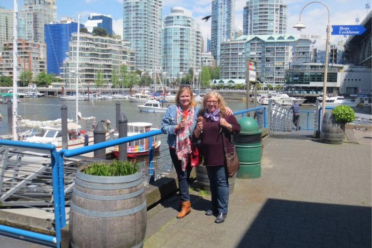 We pose before boarding onto one of False Creek Ferries in Vancouver. Photo by Ferry worker