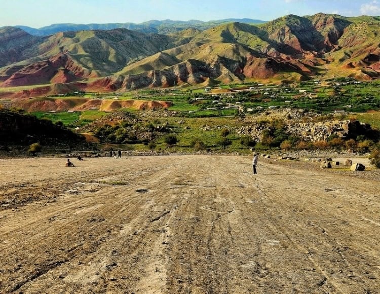 A steep limestone slab at the Dinosaur Plateau is dotted with hundreds of fossilized footprints. Photo by Edward Placidi
