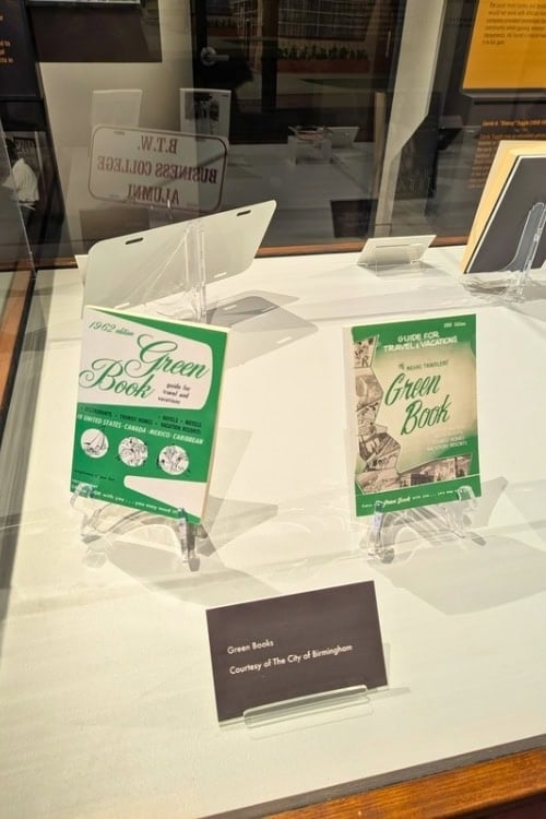 Green Books, guides for Black travelers to find safe places during segregation. Photo by Keri G