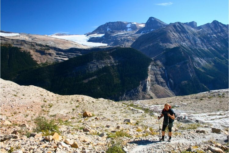 Hiking the sub-alpine plateau where the rugged turf meets the glaciers. Photo by Brent Cassie