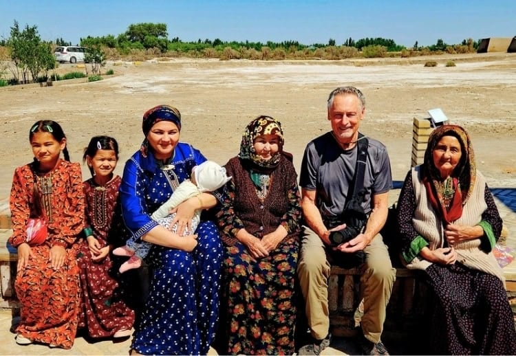 At the Kunya-Urgench ruins, a local visitor exuberantly asked if she could shake hands and take a photo with an 'American.' Photo by Edward Placidi