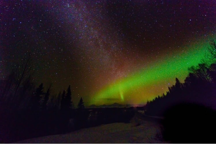 Milky Way and Northern Lights over Denali. Photo by EdwardSnow via iStock