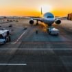 Parked airplane at sunset. Photo by Rocker Sta, Unsplash