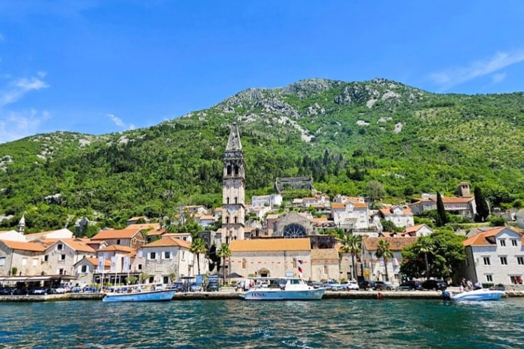 Perast's iconic 180-foot bell tower dominates the town's skyline. Photo by Zuzana Zimmermannova