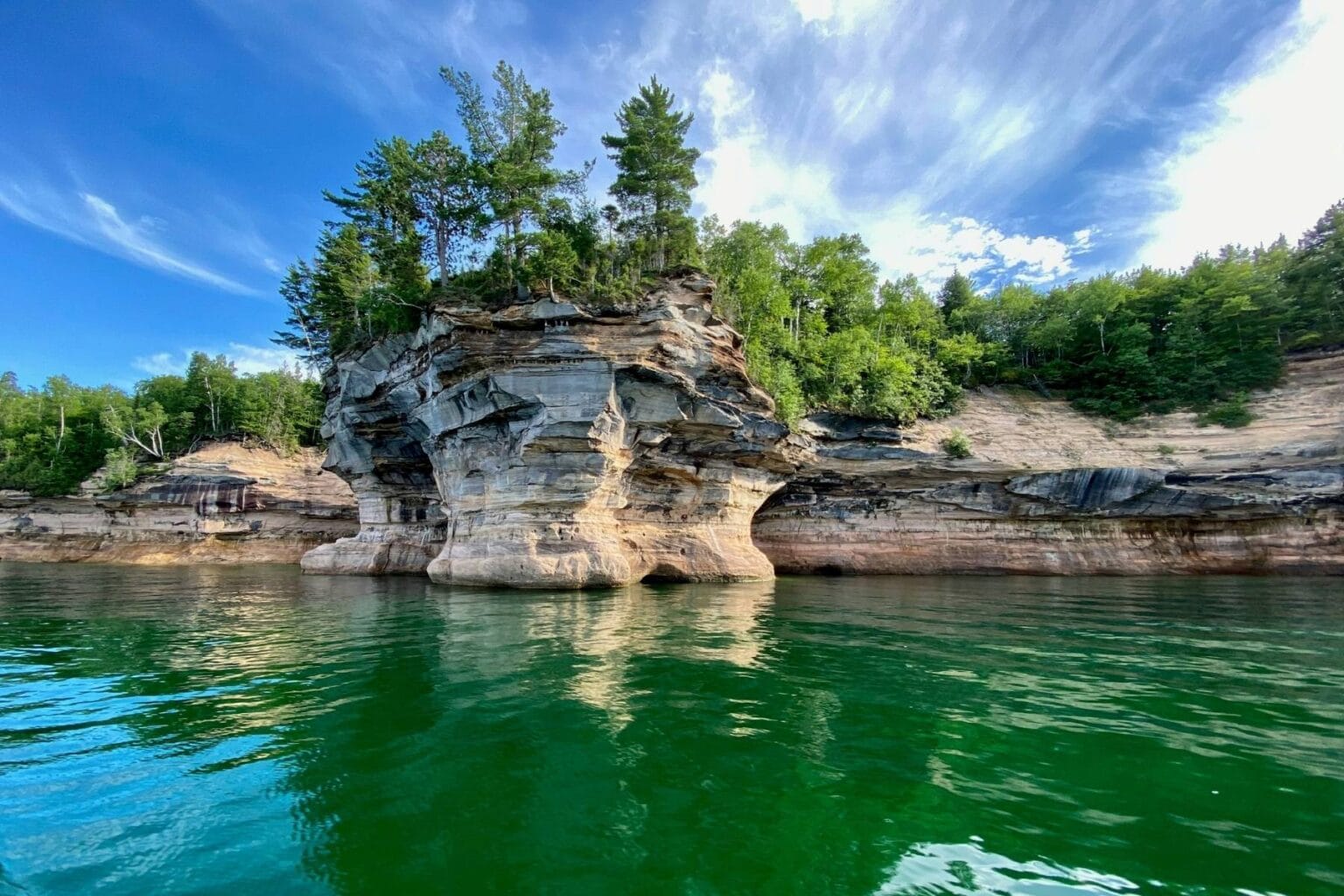 Pictured Rocks National Lakeshore in Pure Michigan&rsquo;s Upper Peninsula. Photo by Charlie Wollborg, Unsplash