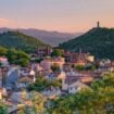 Small town surrounded by trees and mountains in Plovdiv, Bulgaria. Photo by Anton Atanasov, Unsplash Pinterest