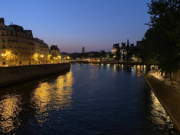 Wandering aimlessly along the Seine at night is one of my favorite Parisian experiences. Photo by Isabella Miller