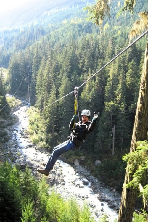 High above Fitzsimmons Creek zipping with Ziptrek Ecotours. Photo by Jane Cassie