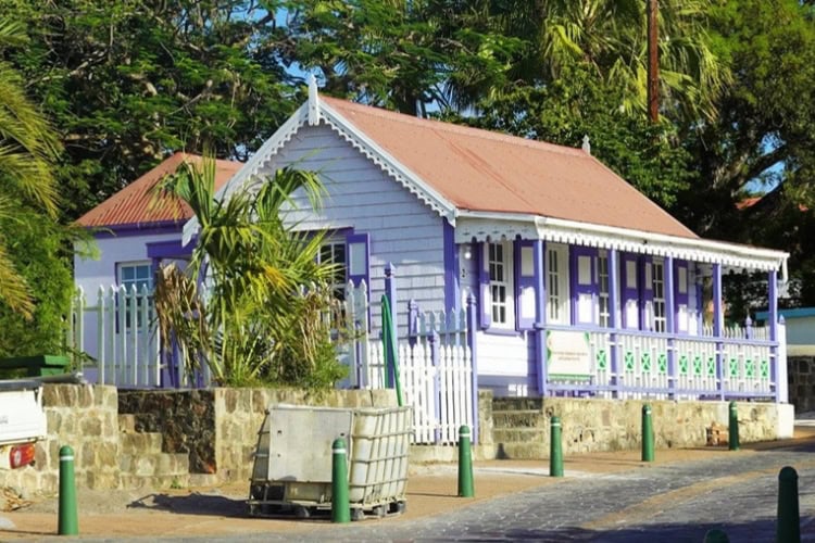 Beautiful old Caribbean buildings stay preserved on island. Photo by Tab Hauser