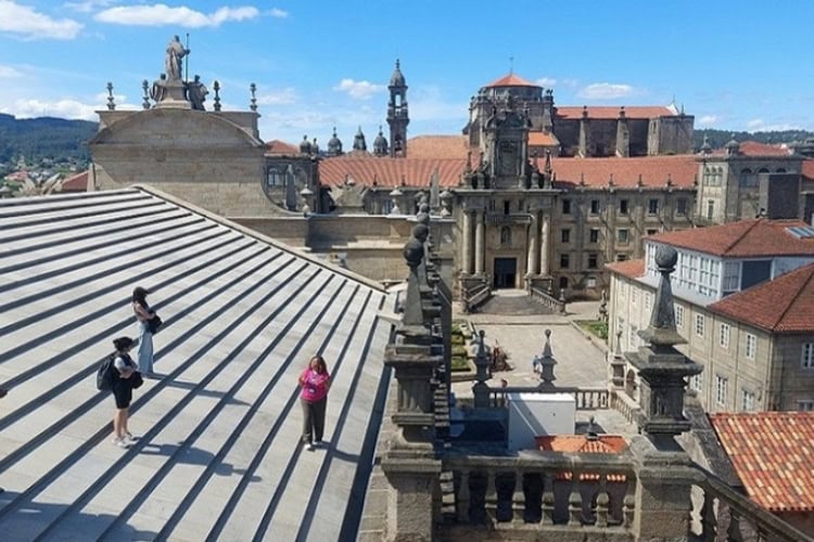 Cathedral rooftop of Santiago de Compostela with grand views of the city below. Photo by Richard Varr