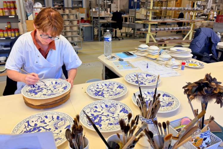 Hand-painted porcelain at Faïencerie de Gien. Photo by Janna Graber