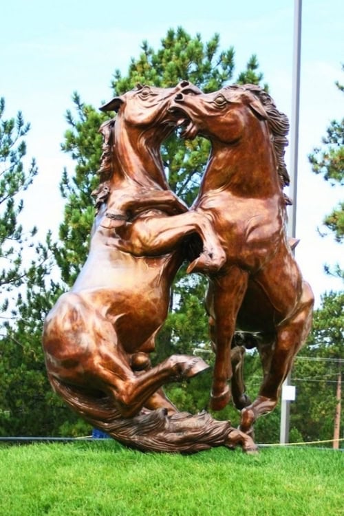 Fighting Stallions bronze sculpture at the Indian Museum of North America. Photo by Frank Hosek