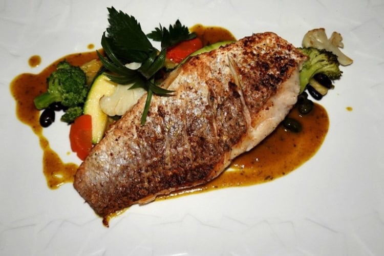 Fresh snapper always on the menu at Bobbies Beach Club. Photo by Tab Hauser