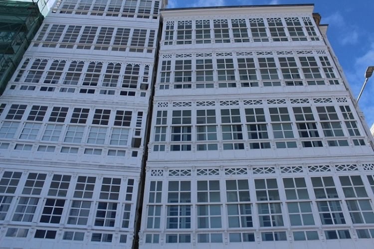 The glass balconies stretching across the entire facades of buildings in A Coruña have given it the nickname \