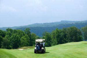 Golf cart on the Highland Course at Primland Resort, Meadows of Dan, United States. Photo by Kenan Kitchen, Unsplash
