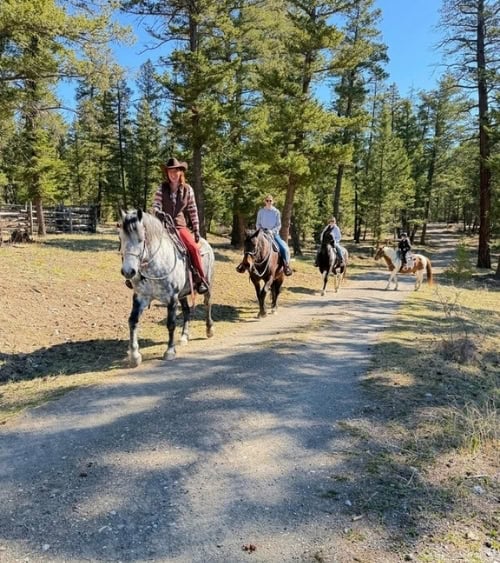 Horseback riding in Echo Valley, mesmerized by the rhythmic clip-clop of hooves in the Cariboo wilderness. Photo courtesy of EVR