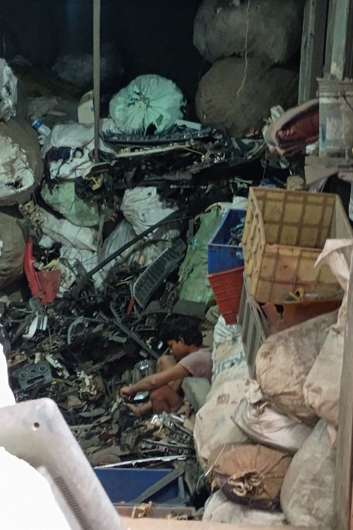 boy living in trash