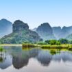 The often overlooked Ninh Binh holds a serene beauty for those who stop. Image by AlexeyPelikh from Getty Images via Canva