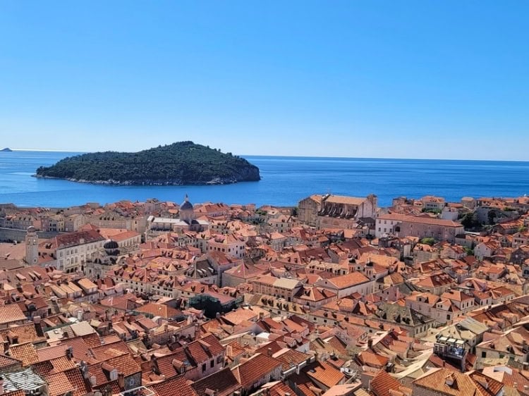 A view of Old Town Dubrovnik from the city walls with Lokrum Island beyond the Adriatic Sea. Photo by Eric D. Goodman