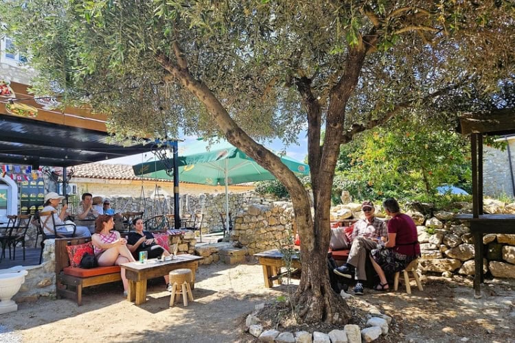 Perfect mornings in Ulcinj look like this hot coffee, cool shade, no rush. Photo by Zuzana Zimmermannova