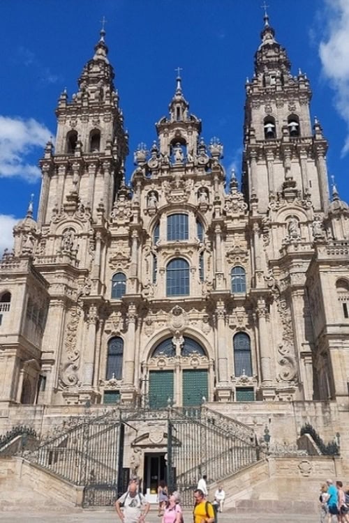Pilgrims gather beneath the Baroque facade of the Cathedral of Santiago de Compostela. Photo by Richard Varr