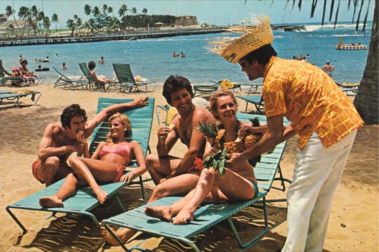 Piña coladas served beachside at Caribe Hilton, in the drink's early years. Photo courtesy of the Hilton Caribe