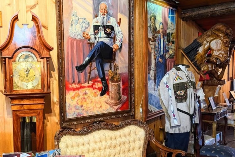Portrait of Korczak in his original log home museum, featuring a collection of original pieces created by Korczak. Photo by Frank Hosek