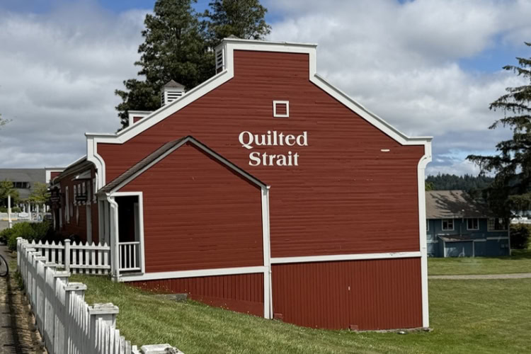 Quilted Strait, offering colorful fabric, sewing supplies, and gifts. Photo by Debbie Stone