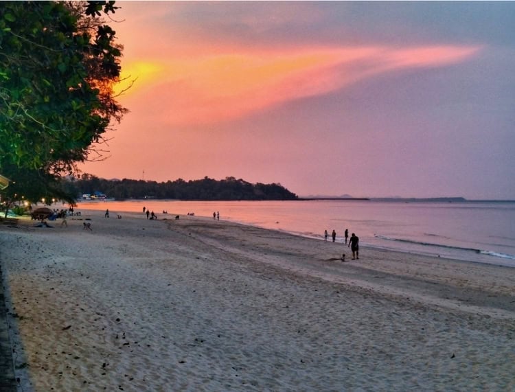 Early evening activity at idyllic Thung Wua Laen Beach as the sun sets. Photo by Michael Cullen