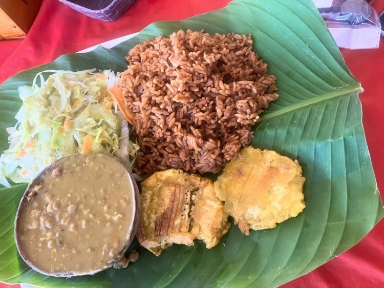 Traditional Palenque food: coconut rice, legumes, and fried plantains. Photo by Carlos Omar Gardinet