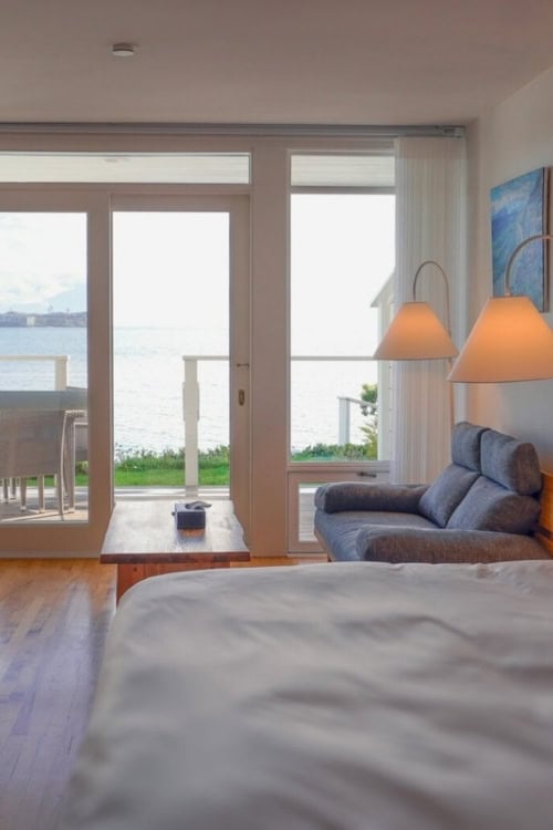 Unique guestroom with handcrafted furnishings and original artwork at the inn. Photo courtesy of the property
