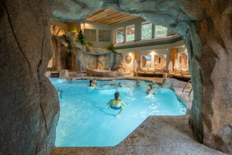 The renowned Grotto Spa offers side-by-side treatments, a warm mineral pool, and peaceful surroundings to unwind together. Photo courtesy of the property