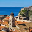 A view of Dubrovnik from the city walls, with Lovrijenac Fortress in the background and the Adriatic Sea beyond. Photo by Eric D. Goodman