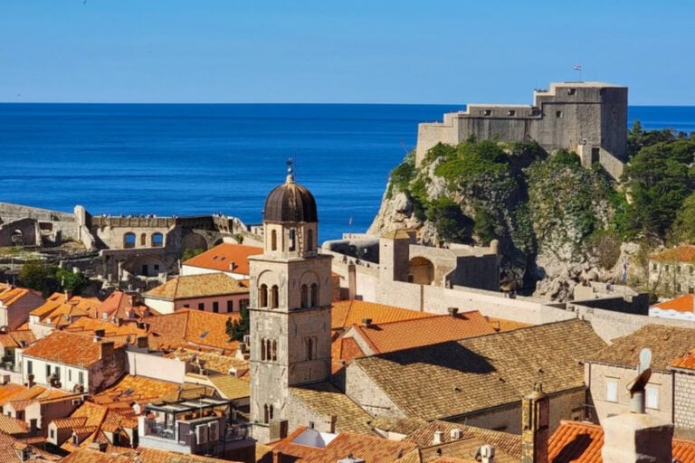 A view of Dubrovnik from the city walls, with Lovrijenac Fortress in the background and the Adriatic Sea beyond. Photo by Eric D. Goodman