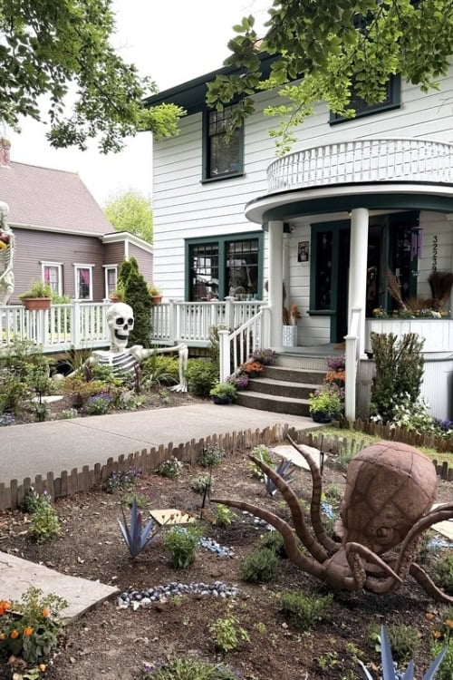 White house with skeletons and an octopus out front at Pretty Stick. Photo by Debbie Stone