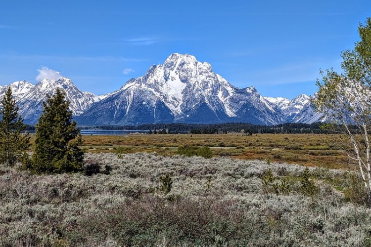 Willow Flats Overlook, located east of Jackson Lake in Grand Teton National Park, offers one of the most accessible and expansive views of Mount Moran in the Teton Range. Photo courtesy of the Grand Teton National Park Service