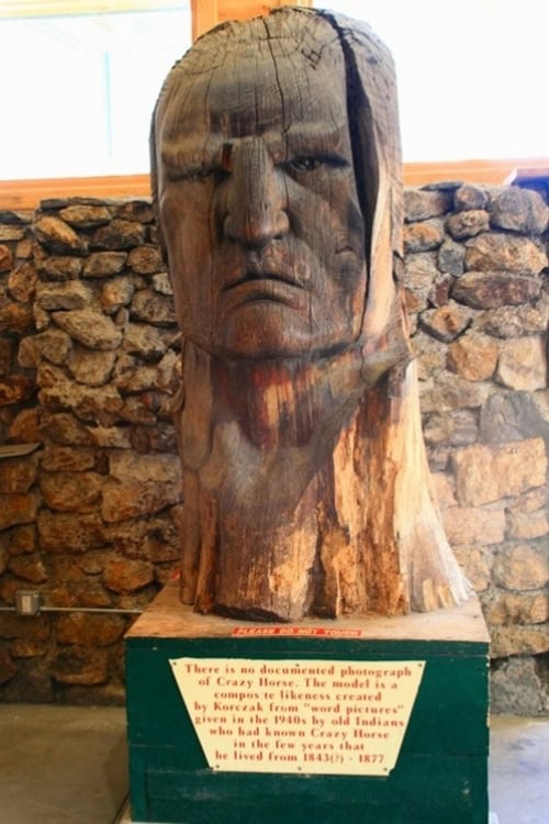 A wood carving of the face of Crazy Horse created by Korczak based on descriptions from Indigenous people. No known photograph exists. Photo by Frank Hosek