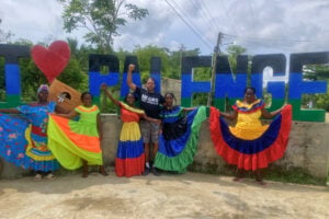 The entrance of the village with the Palenquera women. Photo credit Jose Manuel Fernandez