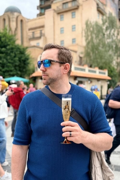 Enjoying a glass of champagne at Disneyland Paris. Photo by Janna Graber