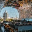 Markthal Rotterdam with restaurants inside Foodhallen, Rotterdam, Netherlands. Photo by Mike van den Bos, Unsplash
