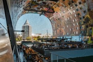 Markthal Rotterdam with restaurants inside Foodhallen, Rotterdam, Netherlands. Photo by Mike van den Bos, Unsplash
