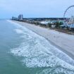 Myrtle Beach coastline with iconic ferris wheel and skyline. Photo by Joel, Pexels